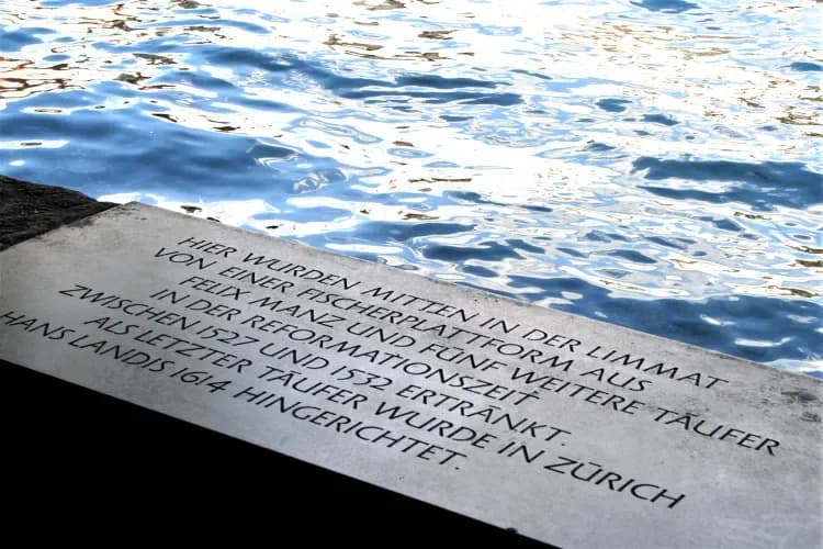 The memorial plaque to Felix Manz on the bank of the Limmat, Zurich